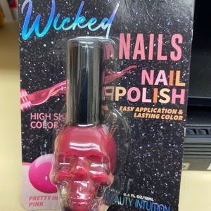 Wicked pretty in pink Nail Polish in scull bottle